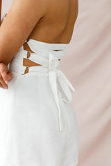 White Strapless Romper with Asymmetric Wrap Skort Overlay