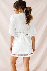 White Mini Skirt with Embroidered Tribal Panel and Fringe Trim